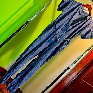 Denim blue romper with pockets